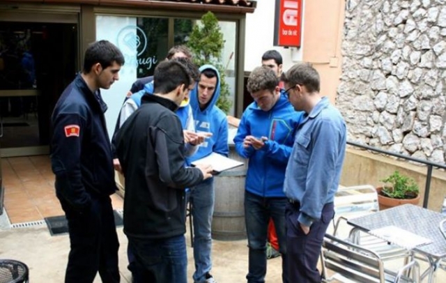  looking at a map to begin their route 